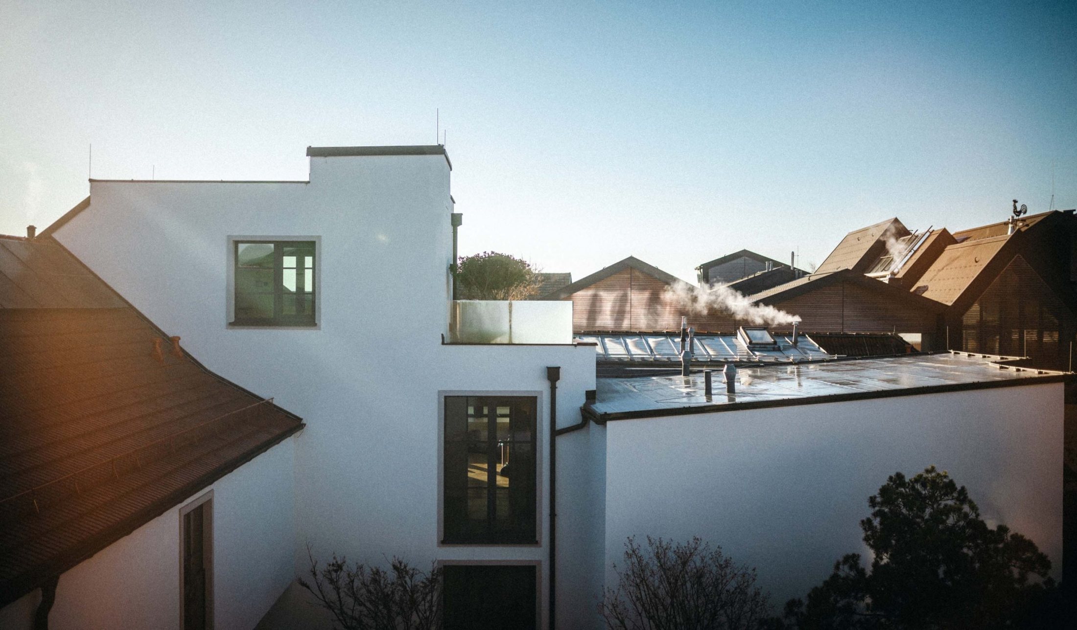 Luxury home at dusk with integrated security and exterior lighting