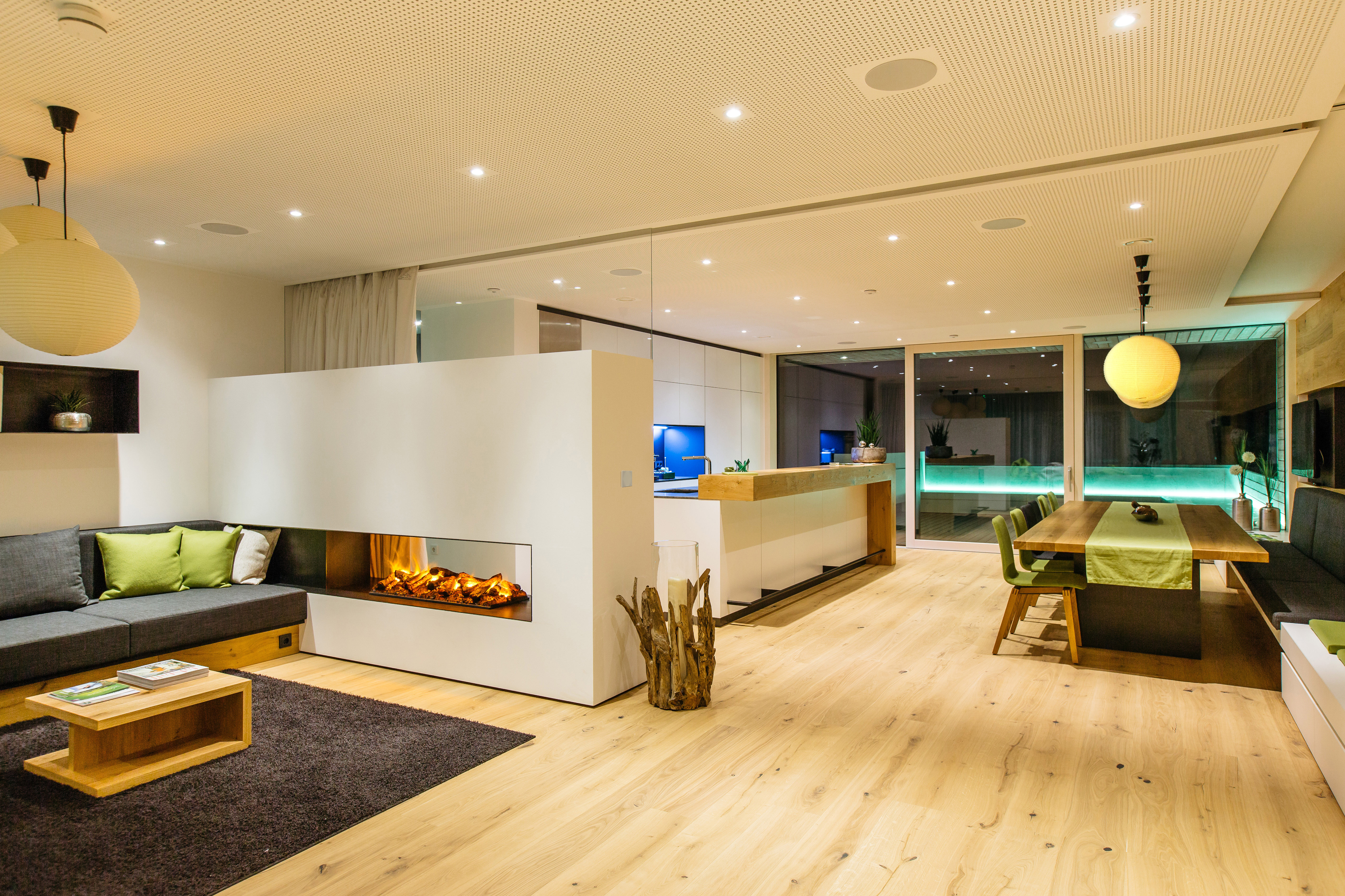 Warm interior with layered Loxone lighting scenes
