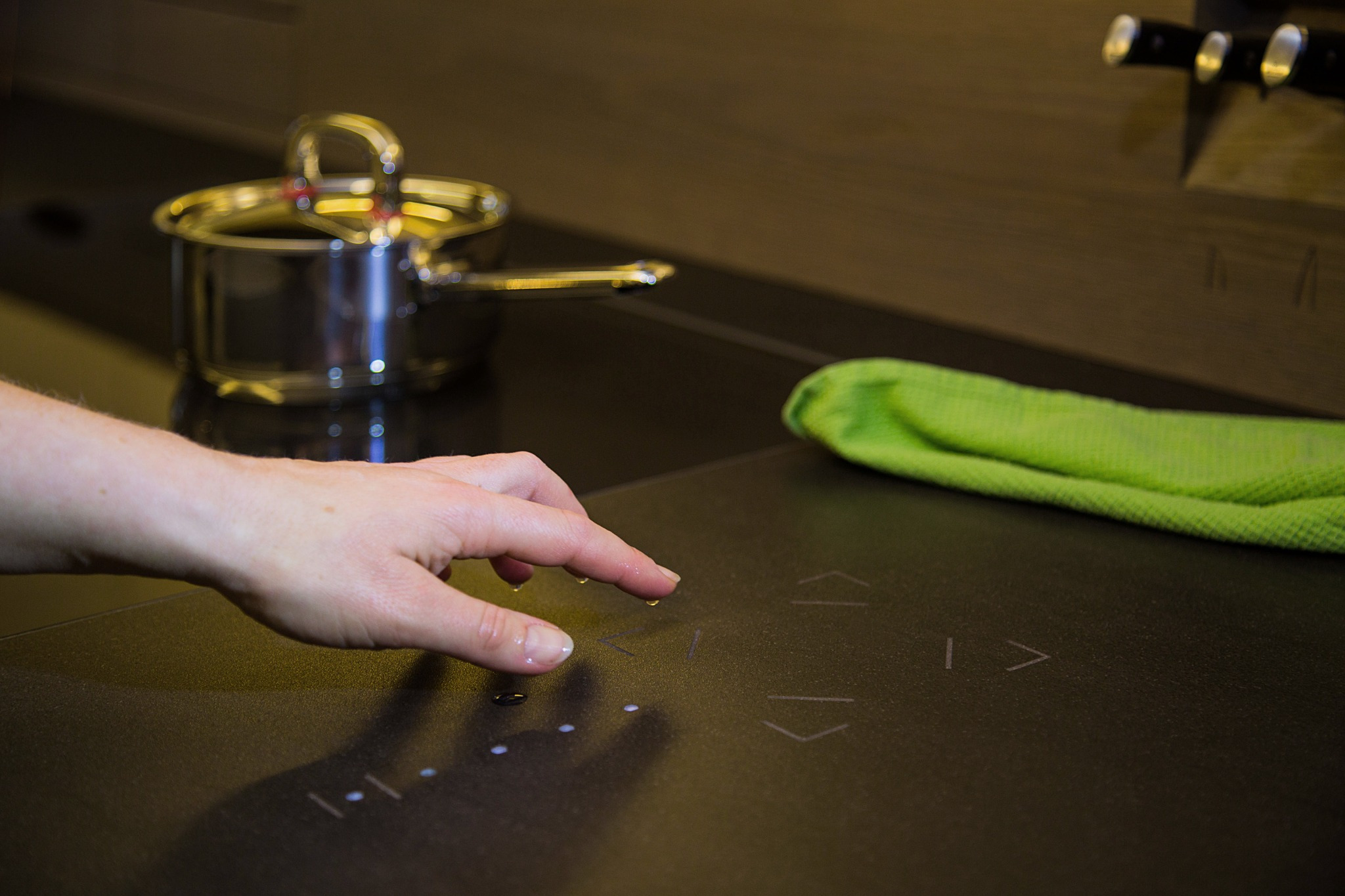 Loxone Touch Surface integrated discreetly into a kitchen worktop
